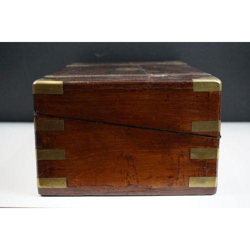 165 - 19th Century mahogany writing slope having brass banding to the exterior opening to reveal a black t... 