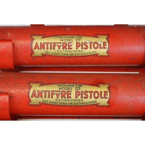 167 - WWII second world war era antifyre pistole model III fire extinguisher having four cannisters. Measu... 