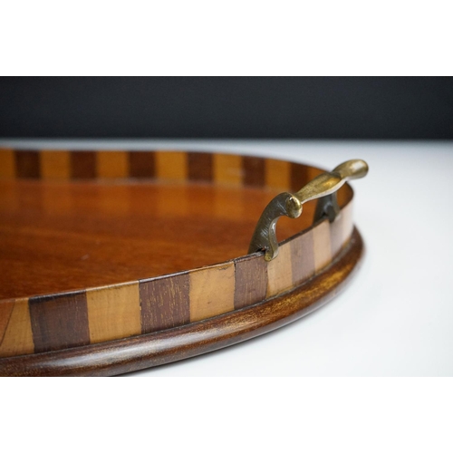 169 - Early 20th Century mahogany inlaid kidney shaped tray having marquetry galleried sides and twin bras... 