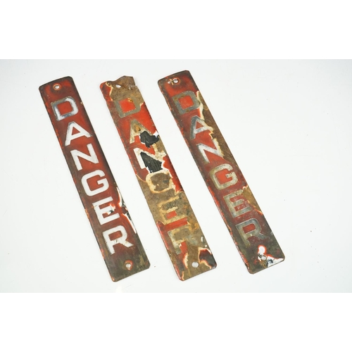 171 - Set of three mid Century red and white enamelled danger signs each of vertical form with drills hole... 