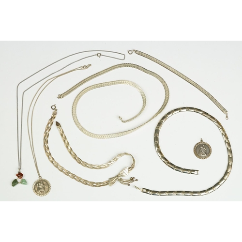 211 - A collection of 925 sterling silver jewellery to include necklaces and St. Christopher pendants.