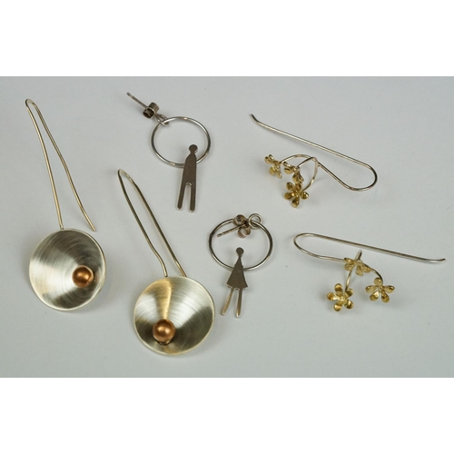 212 - A collection of three pairs of 925 sterling silver earrings to include gilt poppy examples.