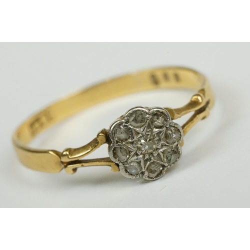 216 - A fully hallmarked 9ct gold band buckle ring together with a ladies 18ct gold dress ring.