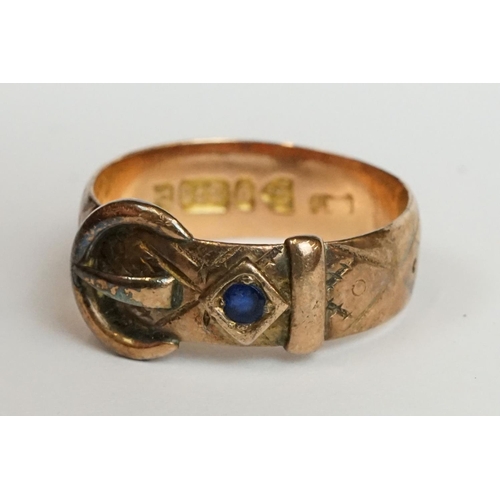 216 - A fully hallmarked 9ct gold band buckle ring together with a ladies 18ct gold dress ring.