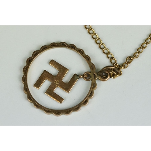 220 - An Edwardian 9ct gold 'Good Luck' pendant and chain link necklace.