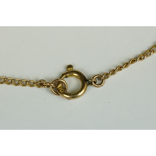 220 - An Edwardian 9ct gold 'Good Luck' pendant and chain link necklace.