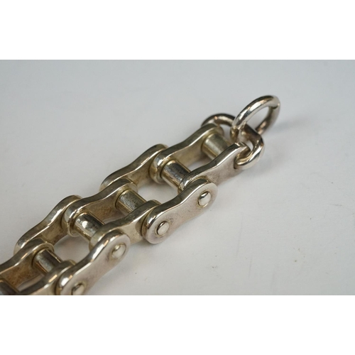 226 - A 925 sterling silver bracelet in the form of a motorcycle chain.