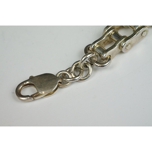 226 - A 925 sterling silver bracelet in the form of a motorcycle chain.