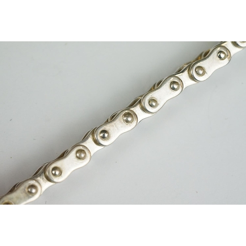 226 - A 925 sterling silver bracelet in the form of a motorcycle chain.