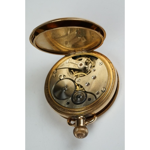 228 - A 10ct gold plated full hunter pocket watch with white enamel dial and sub second dial to 6 o'clock.