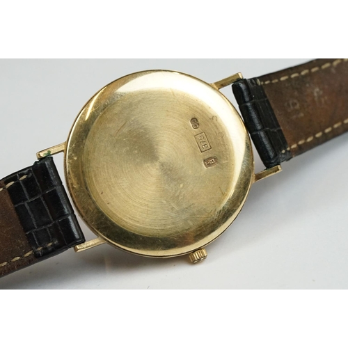 228A - A late 20th century 'Watches of Switzerland' 9ct gold cased quartz watch.