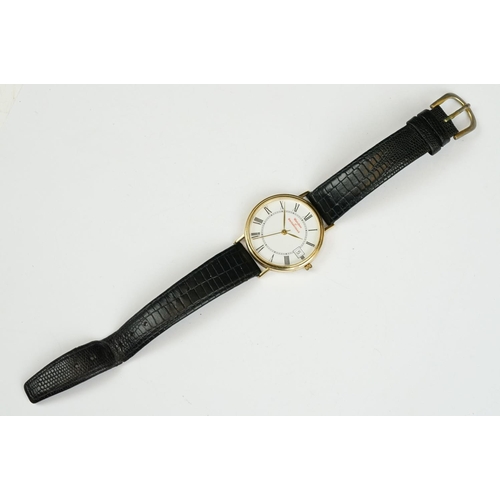 228A - A late 20th century 'Watches of Switzerland' 9ct gold cased quartz watch.