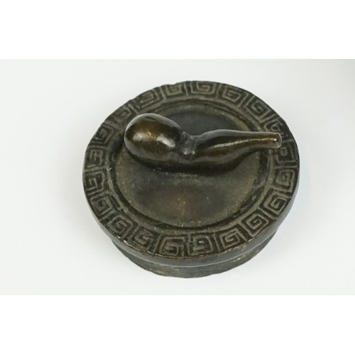 231 - A Chinese bronze miniature teapot.