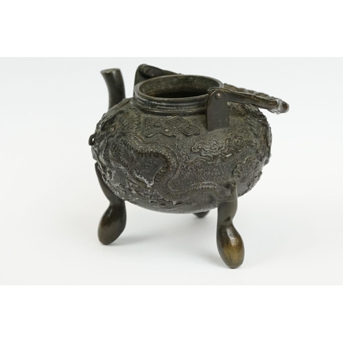 231 - A Chinese bronze miniature teapot.