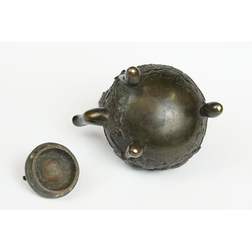 231 - A Chinese bronze miniature teapot.