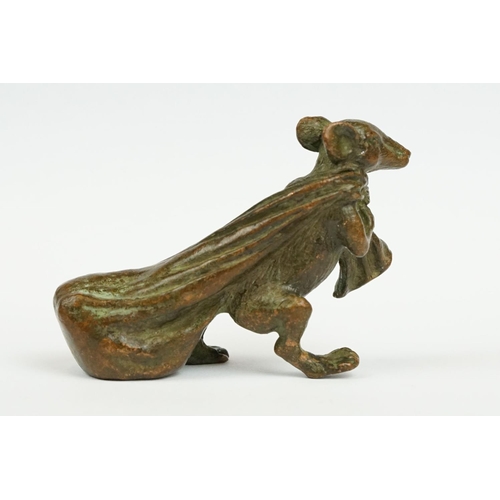 233 - An ornamental Solid brass lucky fortune rat with bag.