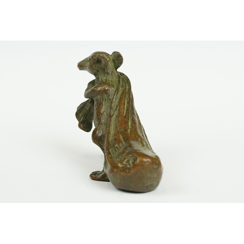 233 - An ornamental Solid brass lucky fortune rat with bag.