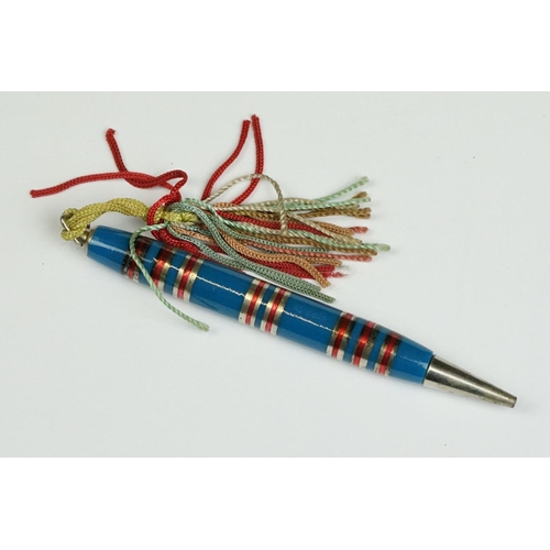 235 - A set of four Bridge propelling pencils with tasseled ends.