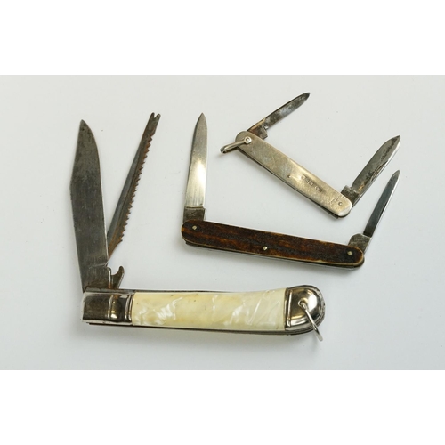 239 - A collection of three vintage pocket knives to include a hallmarked silver cased example.