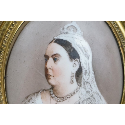 243 - An antique oval ceramic portrait of Queen Victoria.