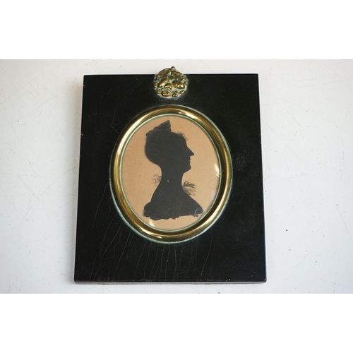 246 - A 19th century silhouette miniature of a lady together with 4 other portrait miniatures.