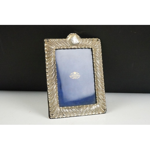 252 - A collection of antique and vintage photograph frames to include two fully hallmarked silver example... 