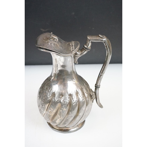 257 - A small collection metalware to include a silver plated coffee pot, sugar shaker, water jug and a pa... 