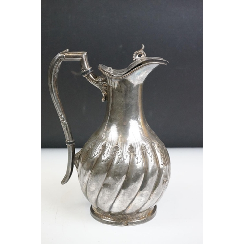 257 - A small collection metalware to include a silver plated coffee pot, sugar shaker, water jug and a pa... 