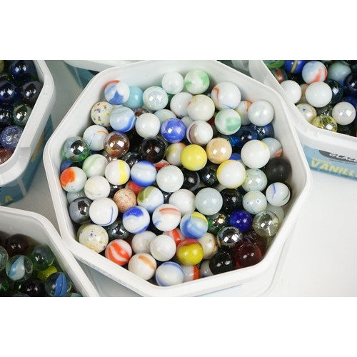 262 - A large collection of glass marbles of varying sizes and colours.