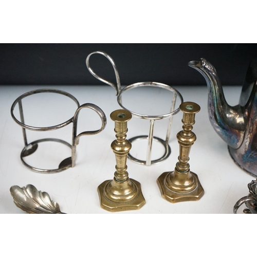 263 - A small collection of mixed silver plate to include teapot, spoons, thimbles, sugar shaker, taper st... 