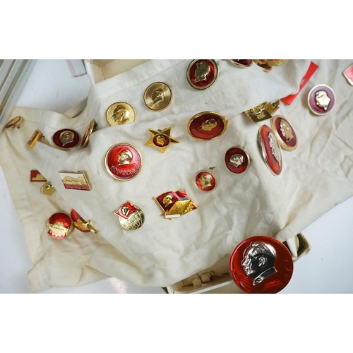 277 - A collection of vintage Russian pin badges.