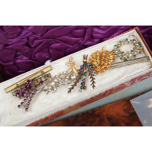 288 - A collection of vintage costume jewellery to include silver examples contained within two wooden box... 