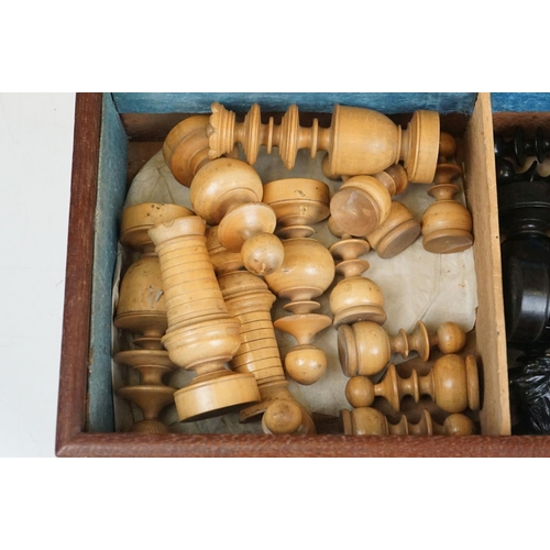 290 - A mid 20th century boxwood chess set in wooden slide top box.