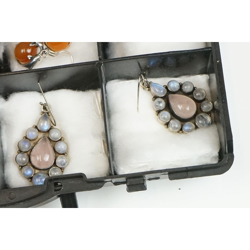 296 - A collection of contemporary silver earrings to include Navajo style set with turquoise together wit... 