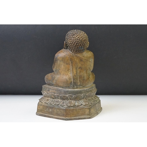 139 - Thai ' Fat Bellied ' Bronze Buddha seated in the lotus position. Measures 20cm high