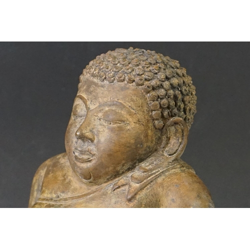 139 - Thai ' Fat Bellied ' Bronze Buddha seated in the lotus position. Measures 20cm high