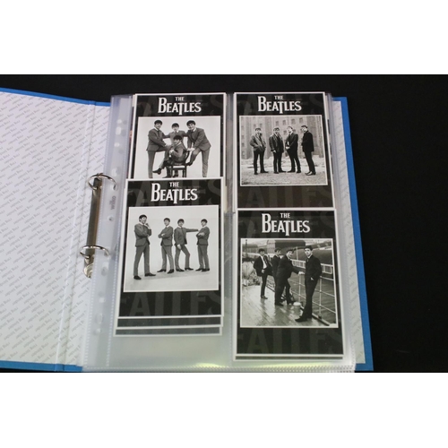 1003 - Memorabilia - Portfolio of Beatles photographs from their early years, mostly black and white, postc... 