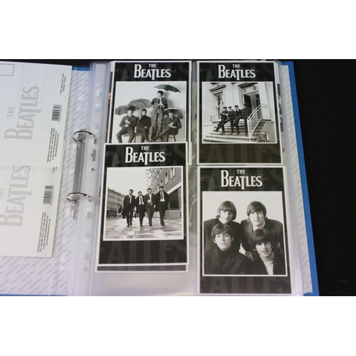 1003 - Memorabilia - Portfolio of Beatles photographs from their early years, mostly black and white, postc... 