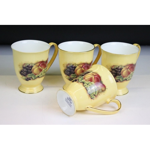 43 - Collection of Aynsley Golden Orchard ceramics to include four tea cups, fruit bowl, three vases, dis... 