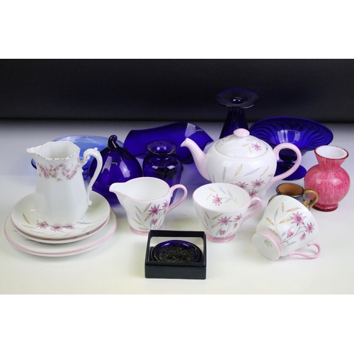 49 - Assorted ceramics to include Shelley pink floral tea set for two, Bristol blue glass, early Royal Do... 