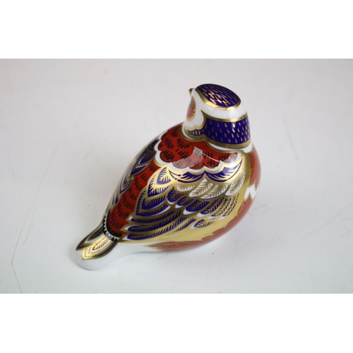 55 - Group of three Royal Crown Derby ceramic paperweights to include two birds with gold stoppers and on... 