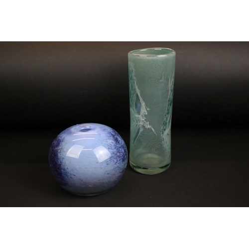 63 - Two mid to late 20th Century studio art glasses. The lot to include a blue cylindrical bubble vase (... 