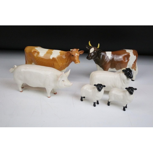 64 - Group of Beswick ceramic animal figurines. The lot to include a pig, ram, two sheep and two cows. Co... 