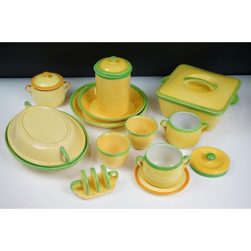 101 - Carlton Ware - A collection of assorted yellow and green ceramics including 'Carlton Ovenware'. The ... 