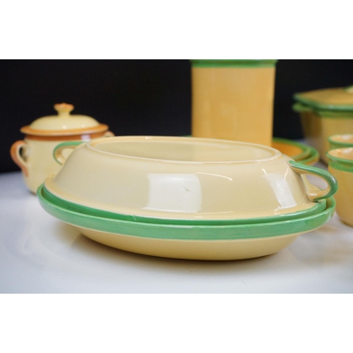 101 - Carlton Ware - A collection of assorted yellow and green ceramics including 'Carlton Ovenware'. The ... 