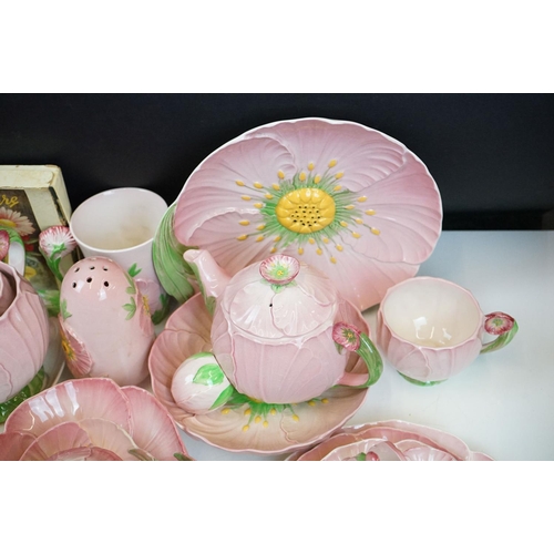 104 - Carlton Ware - Large tea service in the pink buttercup pattern. The lot to include; tea pot, hot wat... 