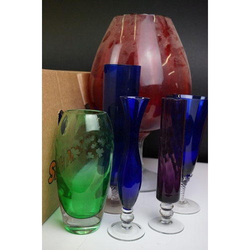 106 - Collection of 20th Century coloured glassware to include cranberry glass vases, blue glass vases and... 