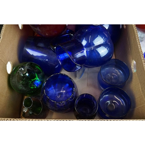 106 - Collection of 20th Century coloured glassware to include cranberry glass vases, blue glass vases and... 