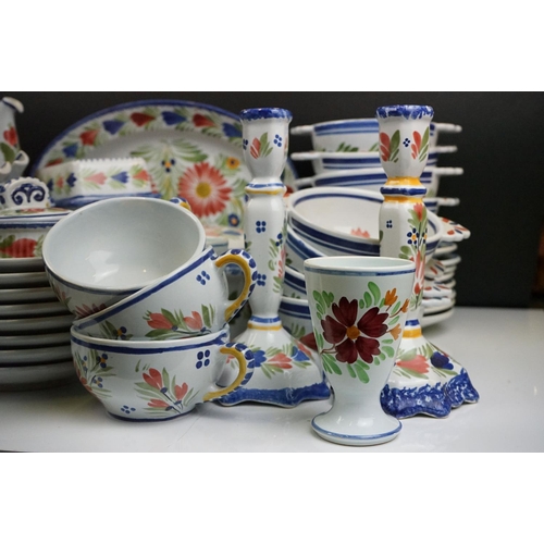 110 - Large French Quimper faience dinner service having a white ground hand painted with floral sprays. T... 