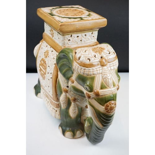 121 - Ceramic elephant jardinere stand / stool in the form of a Chinese elephant with green and yellow gla... 